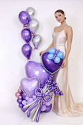 Purple Heart Flower Balloon Arrangement with lavender heart balloons, pearl details, butterfly accents, chrome balloons, and helium cluster
