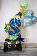 Kids gamer birthday balloons with custom number display, controller details, neon accents, and themed birthday balloon decor