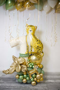 Safari Birthday Balloon Display with custom number balloon, leopard balloon, tiger accent, green gold balloon base, and jungle party decor