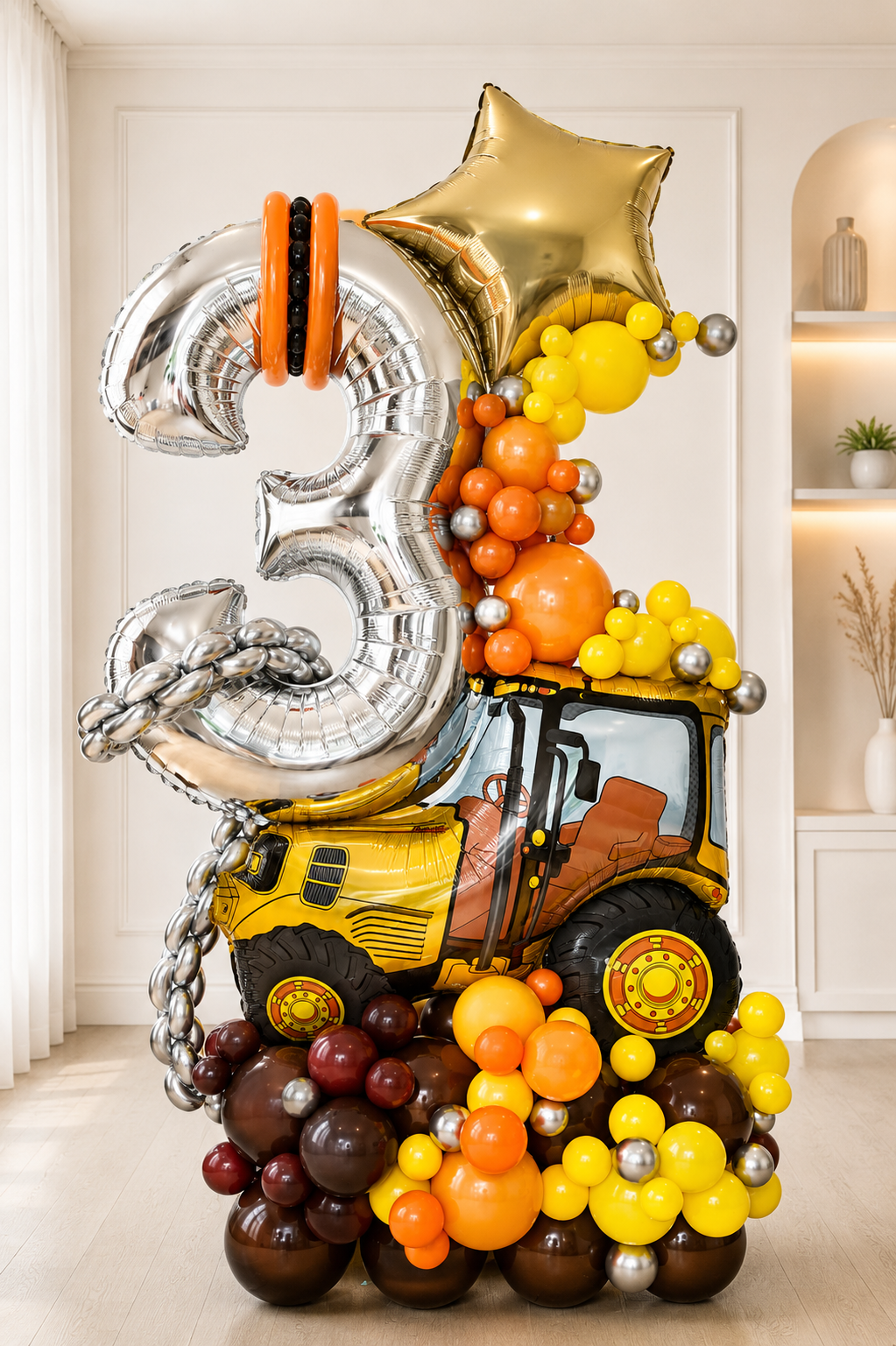 Deluxe construction-themed number 3 balloon display with excavator, chrome silver number, gold star and orange, yellow and brown balloons in Toronto