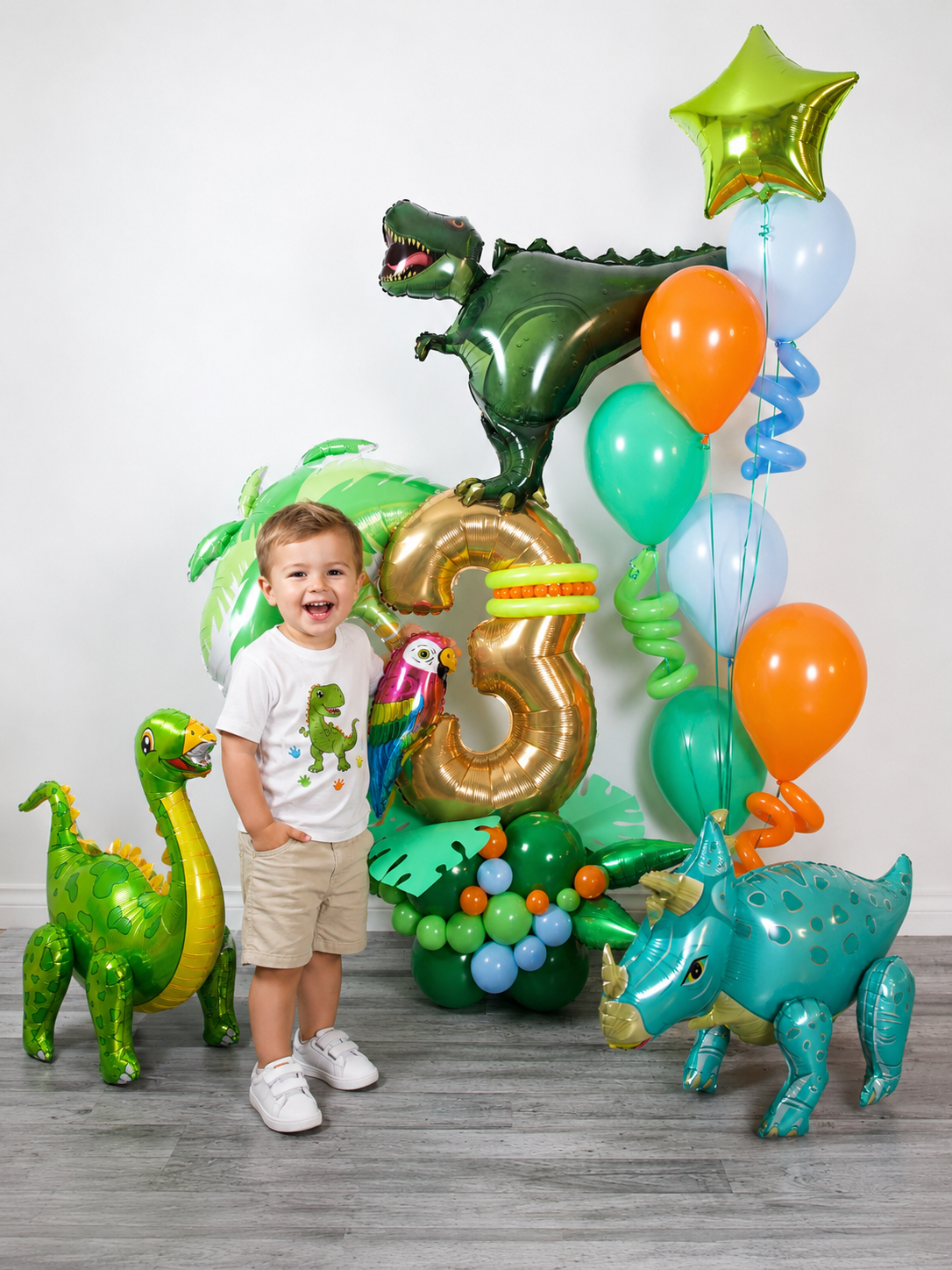 Dinosaur Jungle Balloon Centerpiece with custom number balloon, T-Rex accent, jungle leaves, bright balloons, and Toronto GTA delivery.