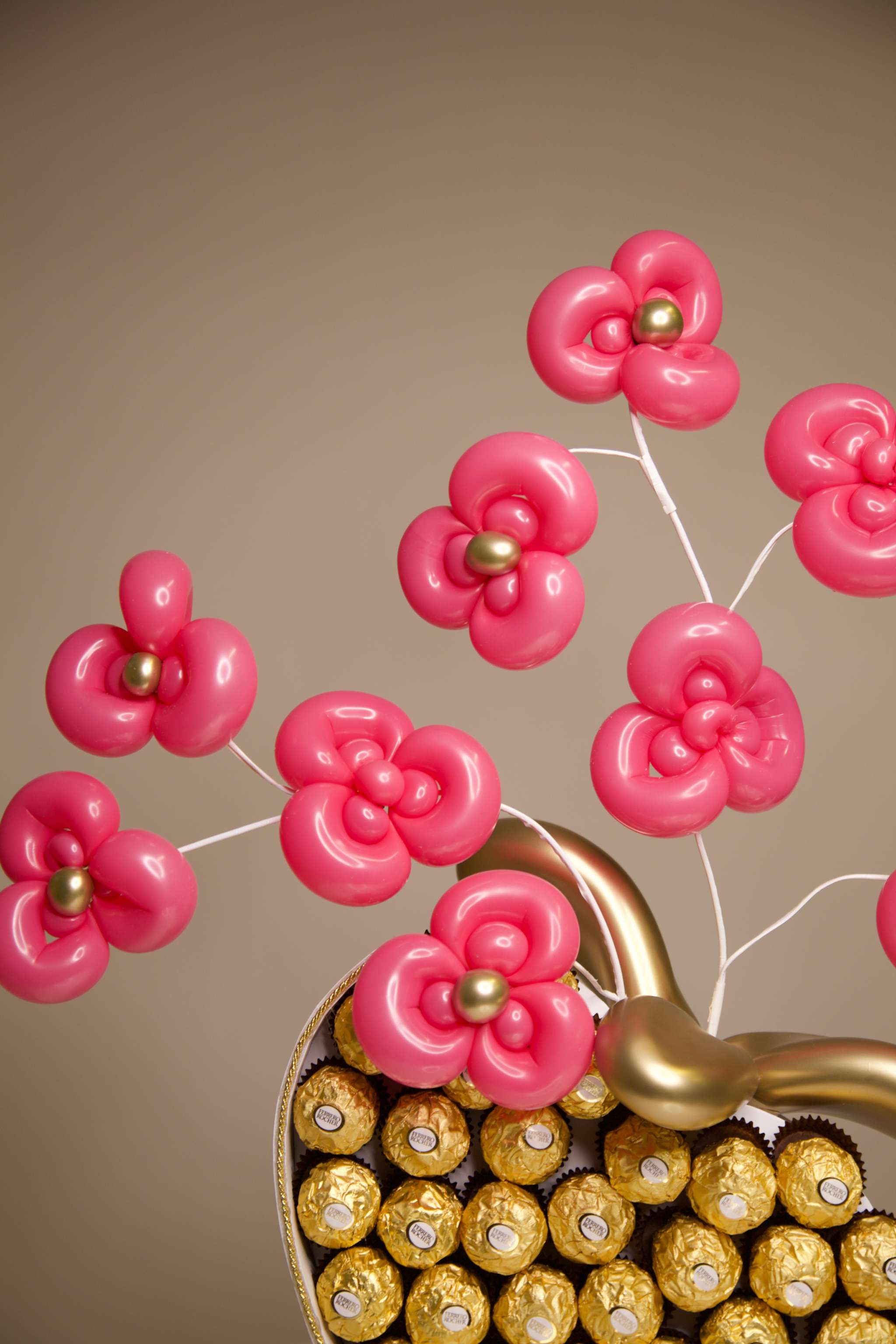 Heart-shaped Ferrero Rocher chocolate gift box with handmade pink balloon flowers