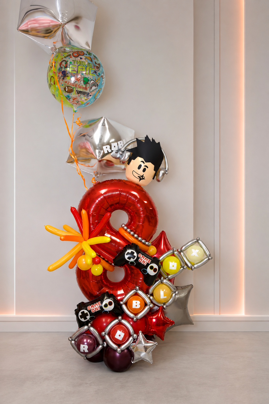 Gaming-themed red number balloon display for a boy's birthday in Toronto