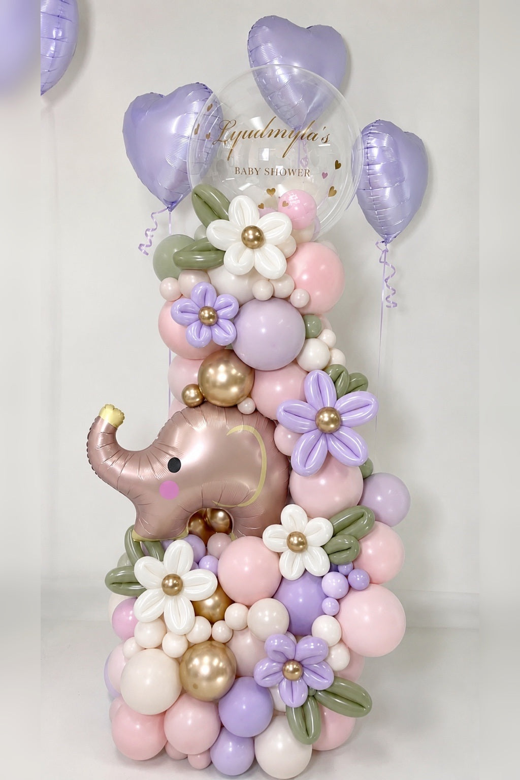 Luxury welcome baby and baby shower balloon arrangement in blush pink, lilac, sage and champagne gold with personalized bubble