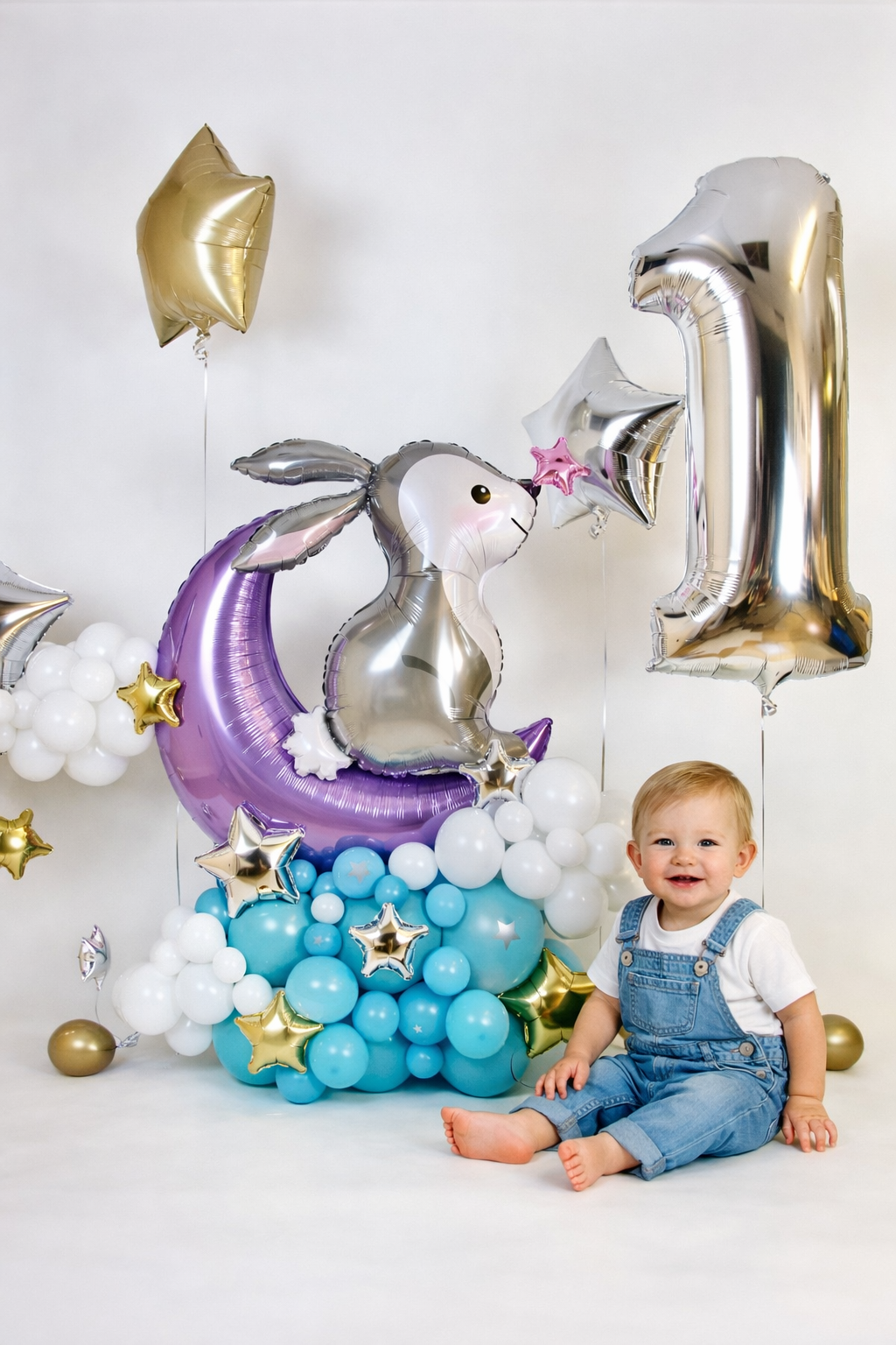 Moon and bunny first birthday balloon display with silver number, lavender crescent moon, clouds and star accents