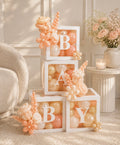 Sculptural Floral BABY Balloon Box display with transparent boxes, premium balloons, and handcrafted balloon flowers for baby showers and first birthdays