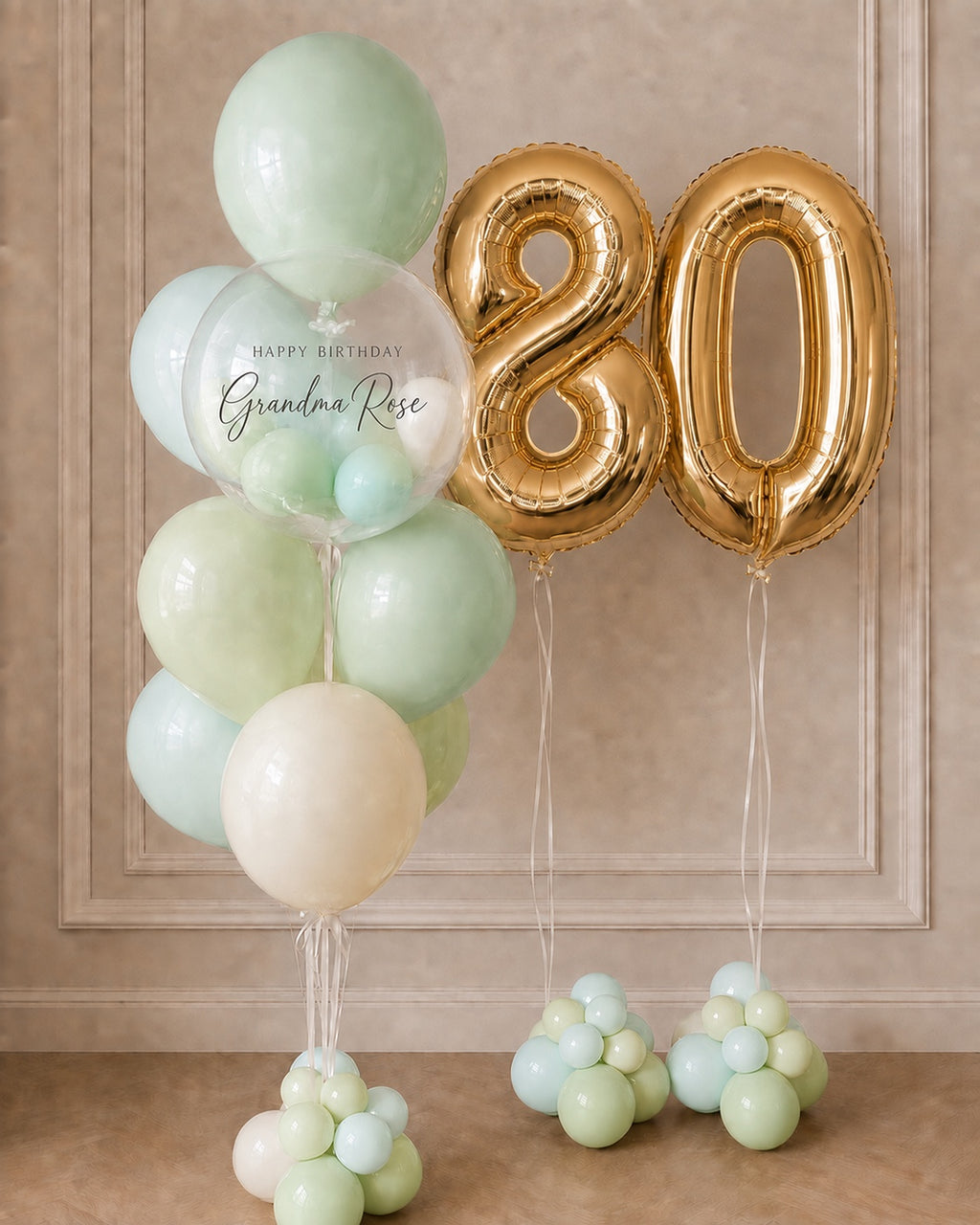 Personalized mint and gold 80th birthday balloon bouquet in Toronto