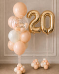 Personalized peach and gold double-digit birthday balloon bouquet in Toronto