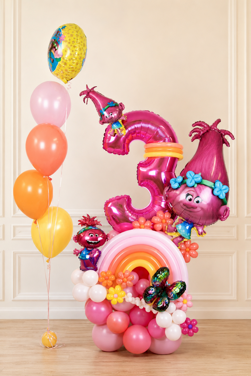 Pink rainbow character number balloon display for a child’s birthday in Toronto