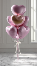 Luxury pink heart balloon bouquet with blush metallic satin finish and ivory bow