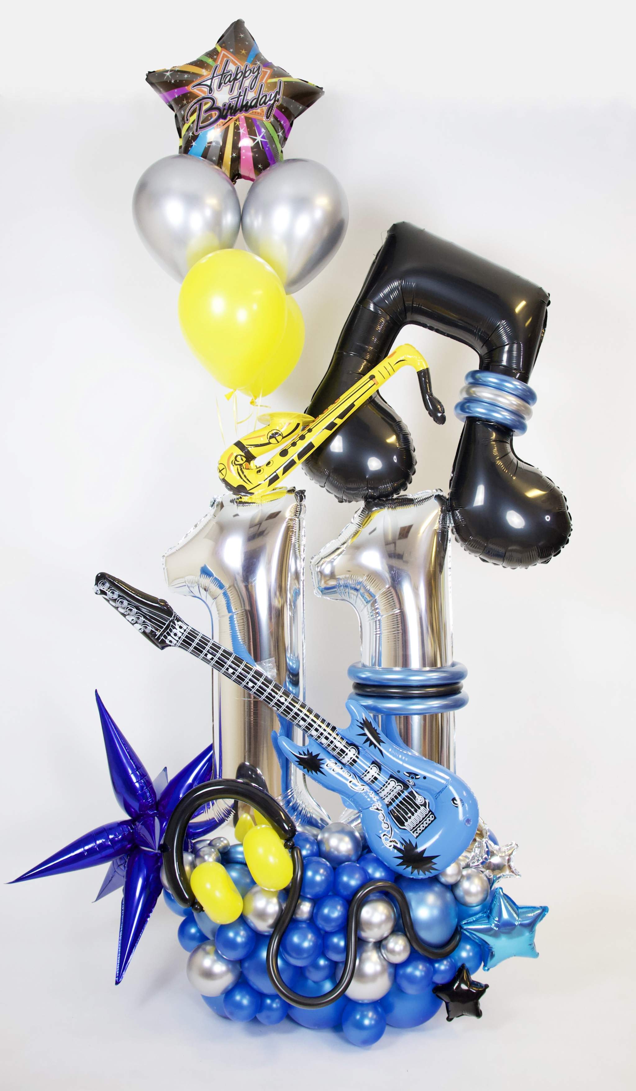Rock Star Birthday Balloon Display with one or two age numbers, musical notes, guitar accents and blue balloon base