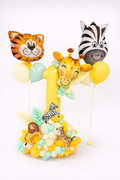 Safari Balloon Number Display with giraffe, tiger, zebra, and lion balloons, custom number balloon, and jungle styling in Toronto.