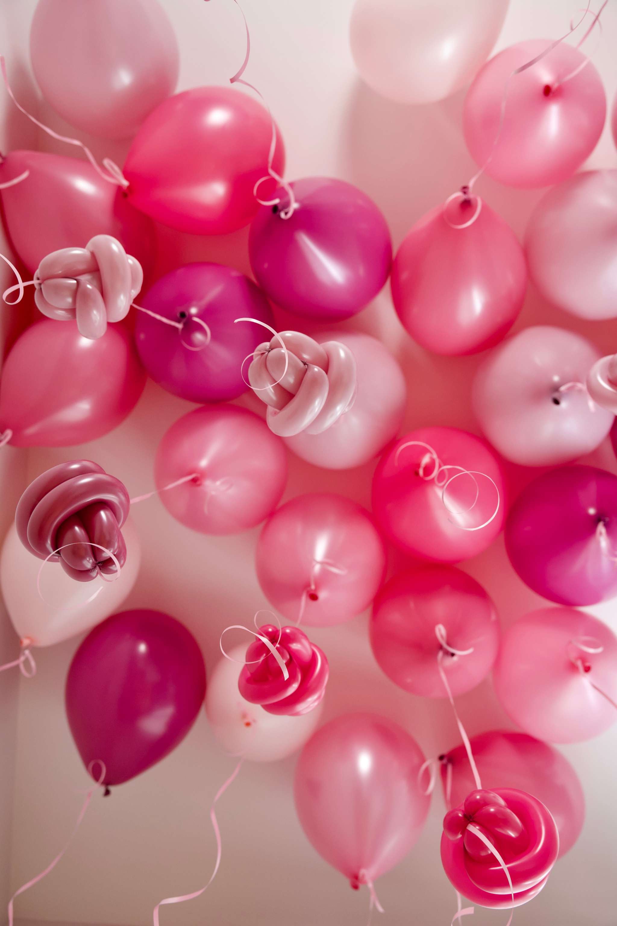Pink, blush and magenta helium balloons with small twisted balloon flowers, perfect for kids birthday balloon decor