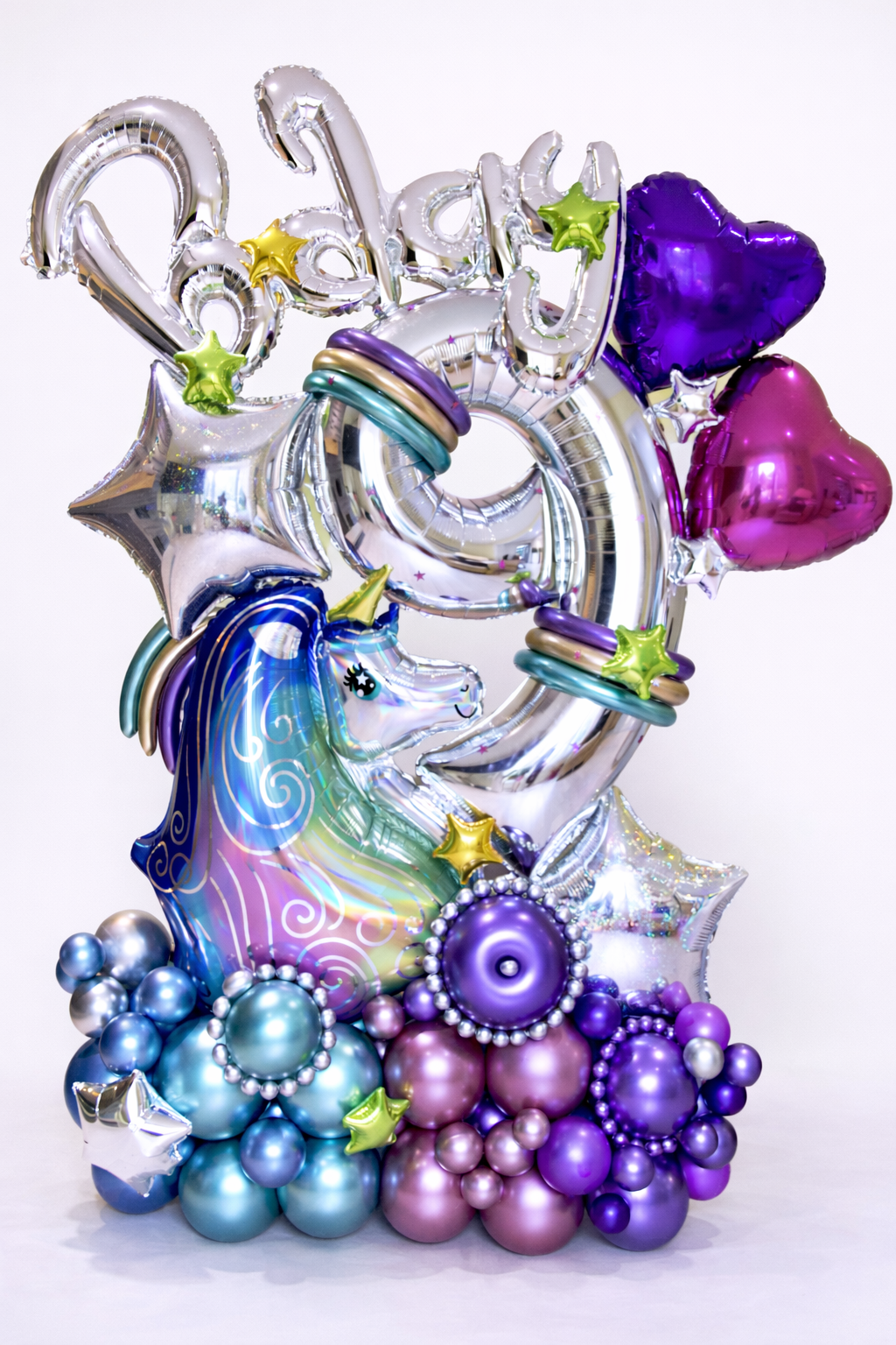 magical unicorn birthday balloon stack with star and heart balloons