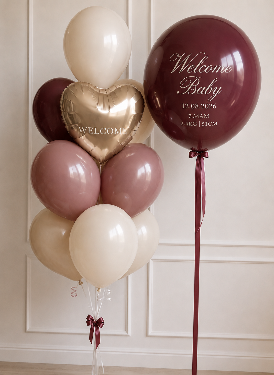 Burgundy Champagne personalized welcome baby balloon bouquet in wine, dusty rose, ivory and champagne