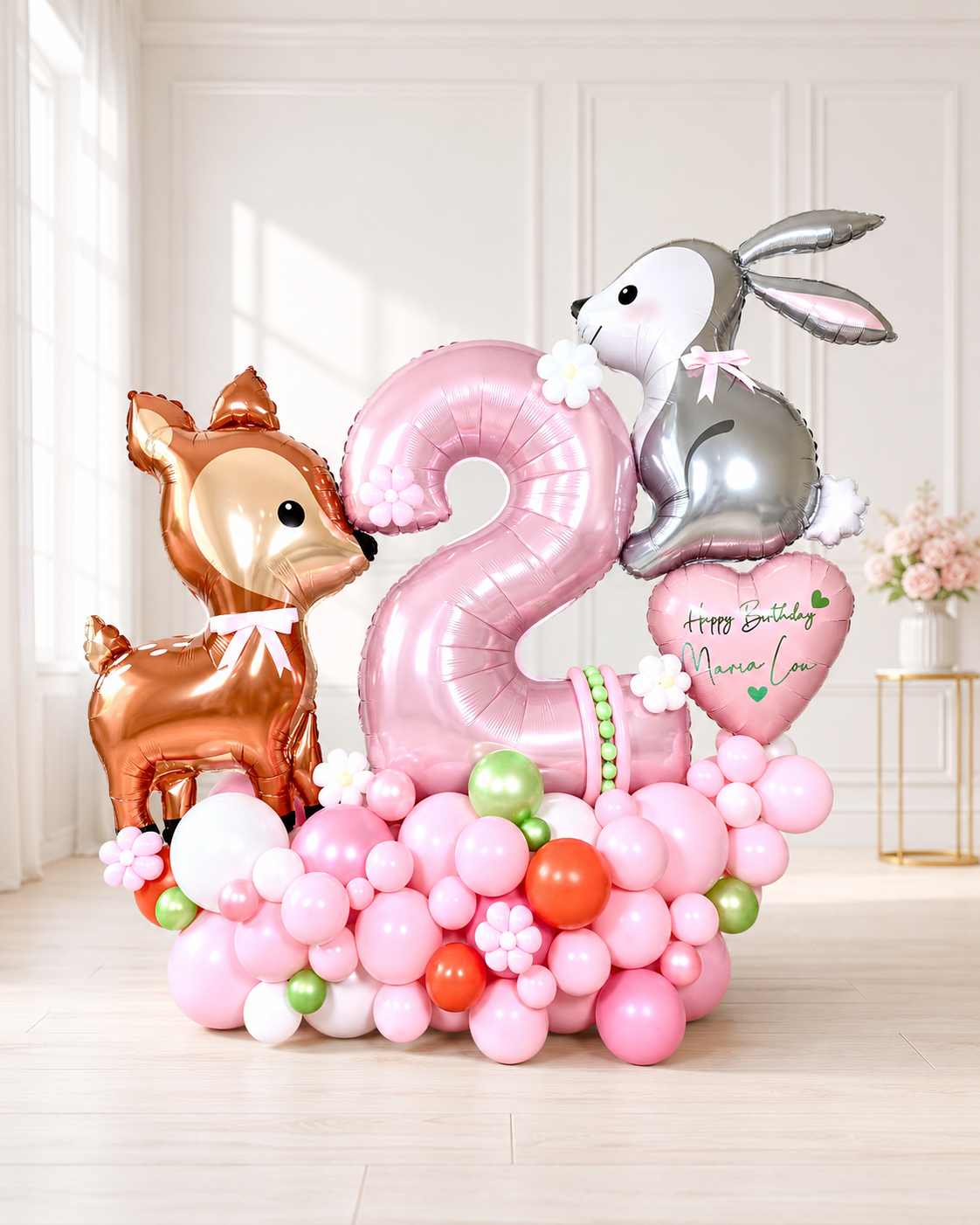 Pink woodland bunny and deer second birthday number balloon display with personalized heart and floral details in Toronto